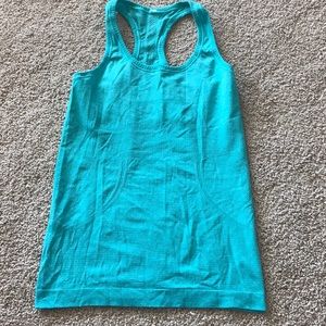 Turquoise tank top.
